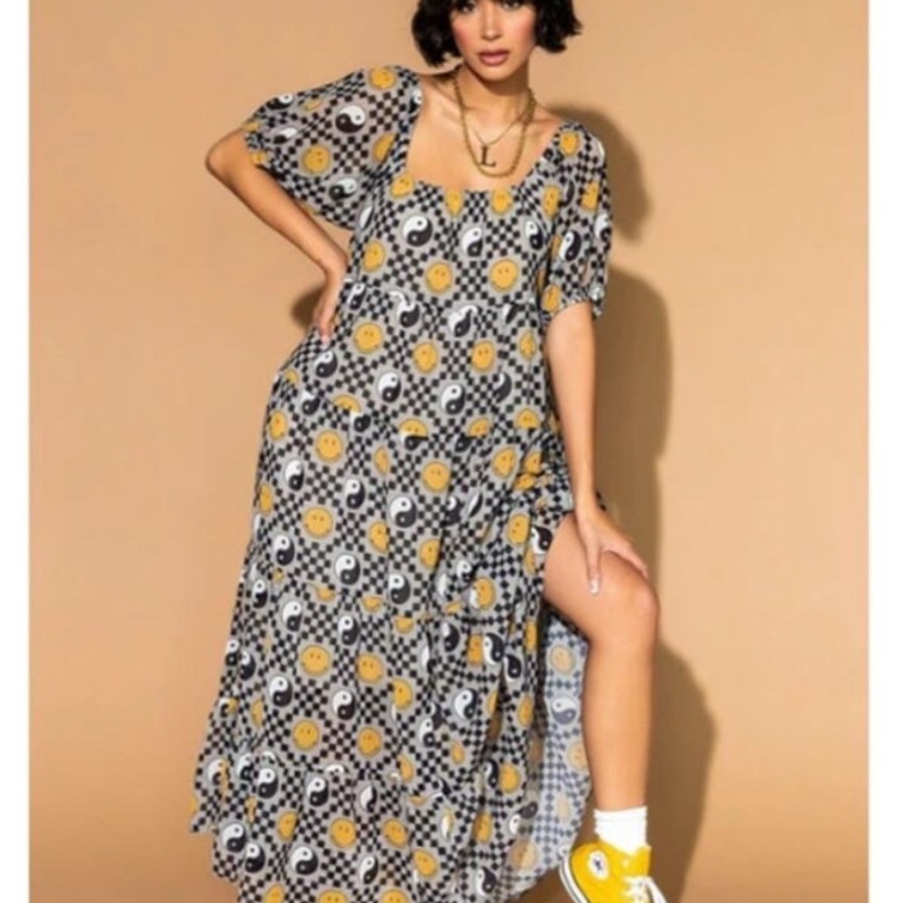 Dressed in La La smiley and yin yang dress